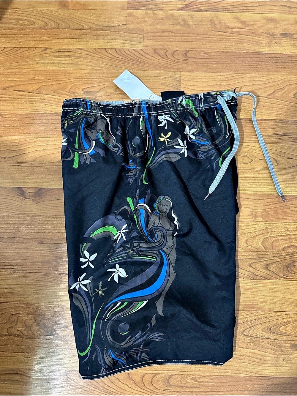 Floral Swim Trunks in Black & Blue Like New